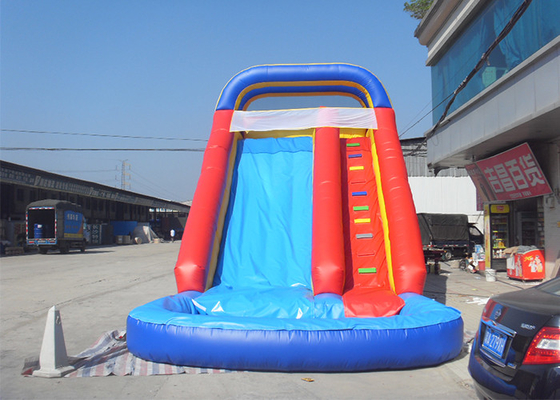 China Thickness 0.55mm PVC Heavy Duty Rainbow inflatable water slides With Pool supplier